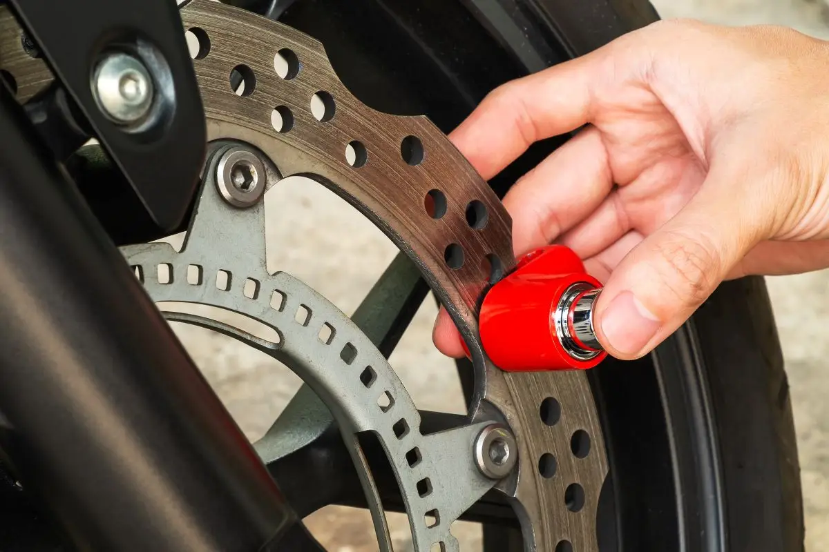 Red motorcycle disc lock